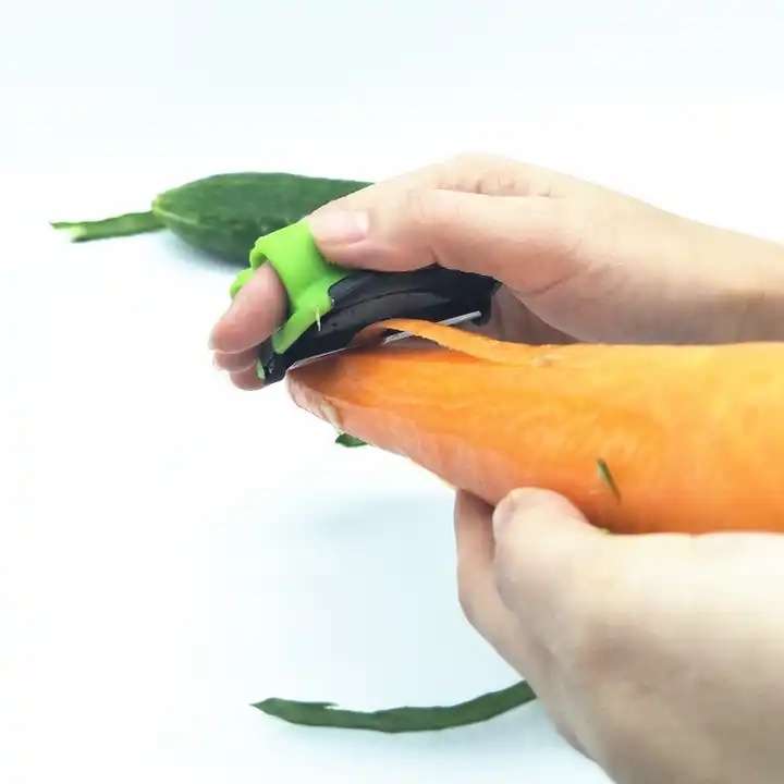 Plastic Stainless steel double finger fruit ,palm and vegetable peeler - Image 3